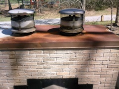 Marietta's Best Gutter Cleaners' Certainteed Certified roofers can install or replace your custom chimney pan.