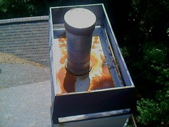 Marietta's Best Gutter Cleaners' Certainteed Certified roofers can install or replace your custom chimney pan.